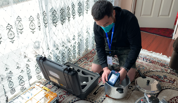 A Public Health-Seattle and King County specialist checks a home for lead